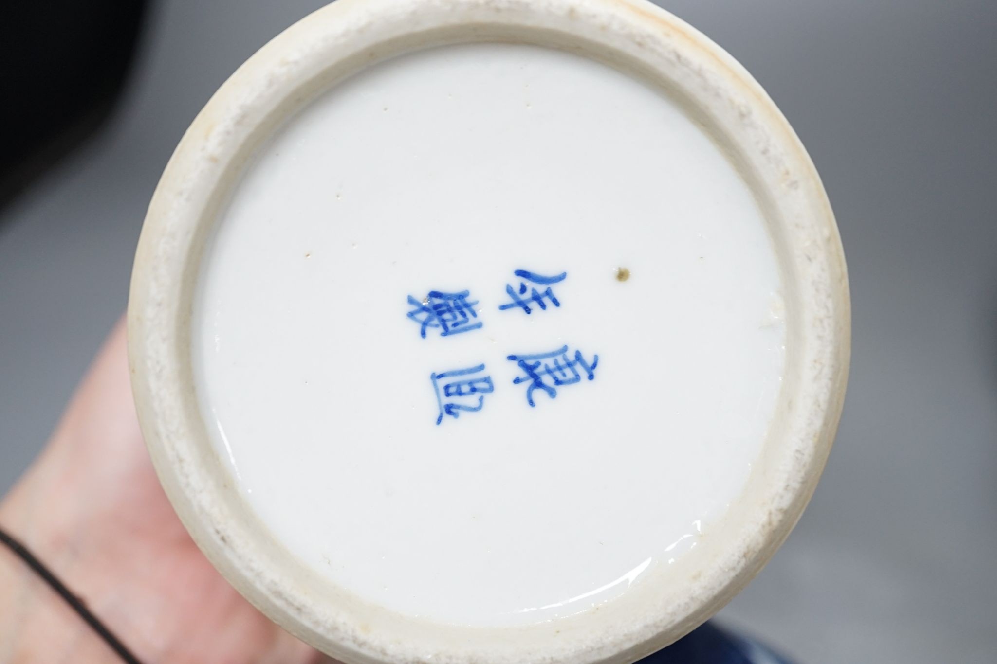 Three Chinese blue and white prunus decorated jars and covers, 19th/20th century, with four character marks 18cm